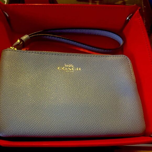 Coach Handbags - COACH Light Blue Zip Wristlet Wallet